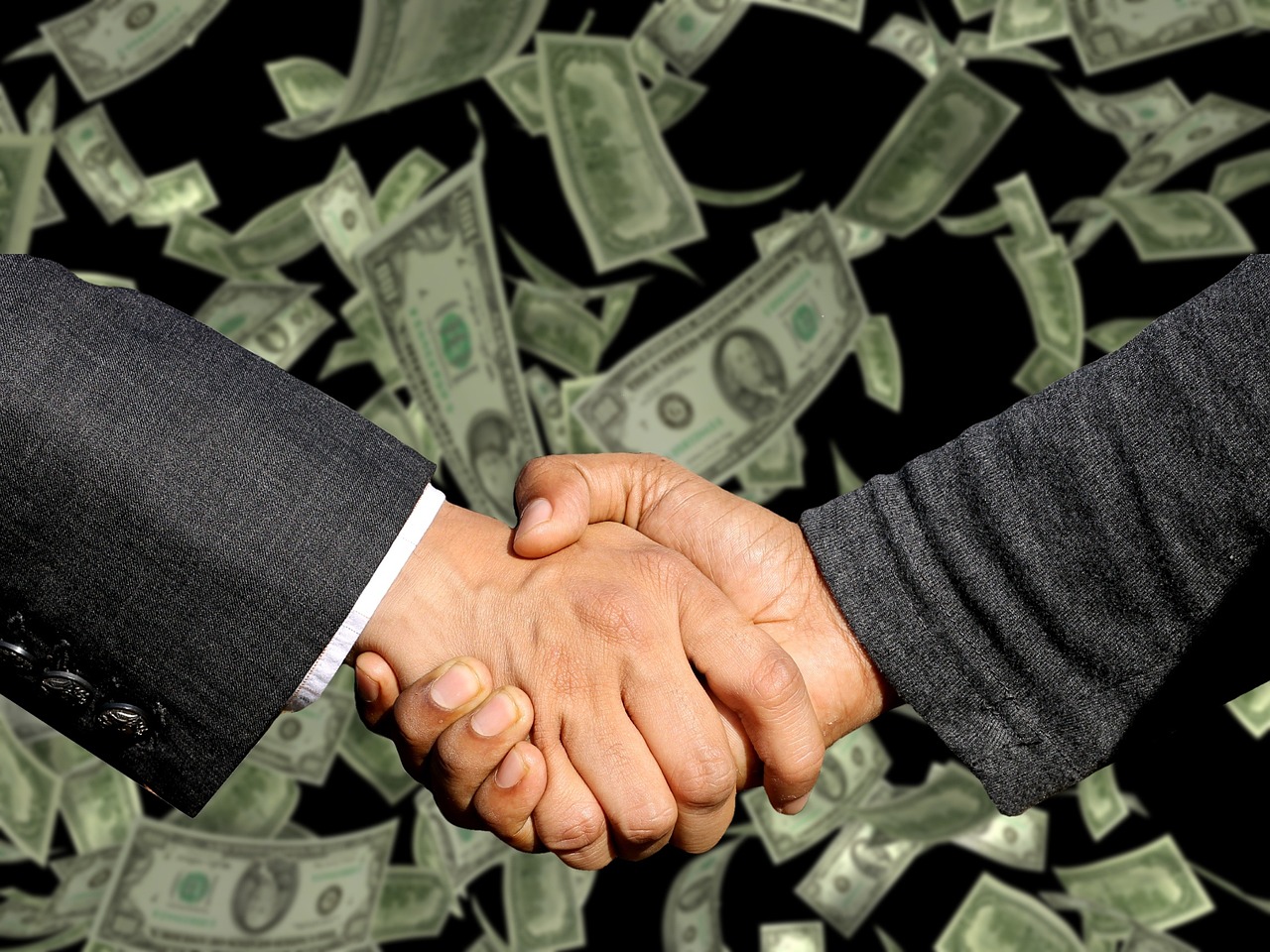 business handshake partnership suppliers